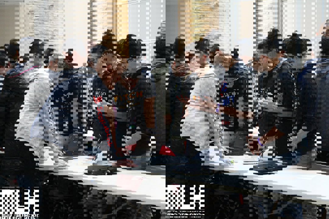 Group of students talking at the Hack Western 6 event