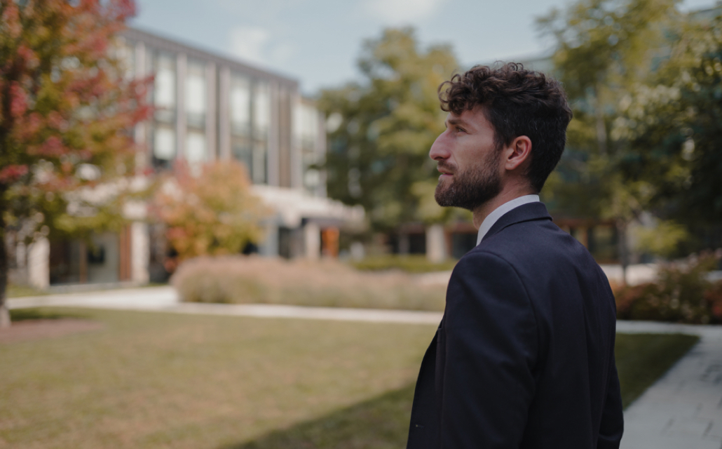 Student Looking Upon Ivey Courtyard