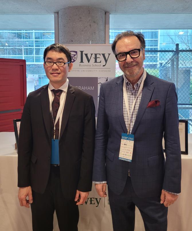 Gary Kim & George Athanassakos at the Ivey Booth